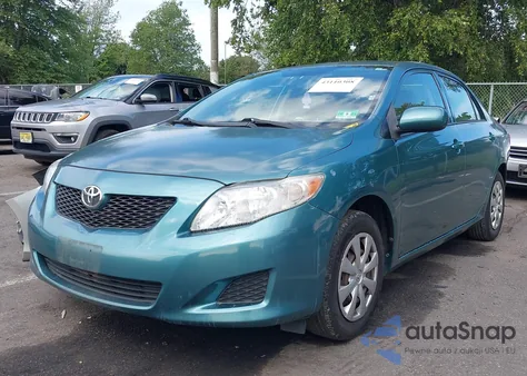 2009 Toyota Corolla Le z USA, uszkodzony, nr VIN JTDBL40E599077877